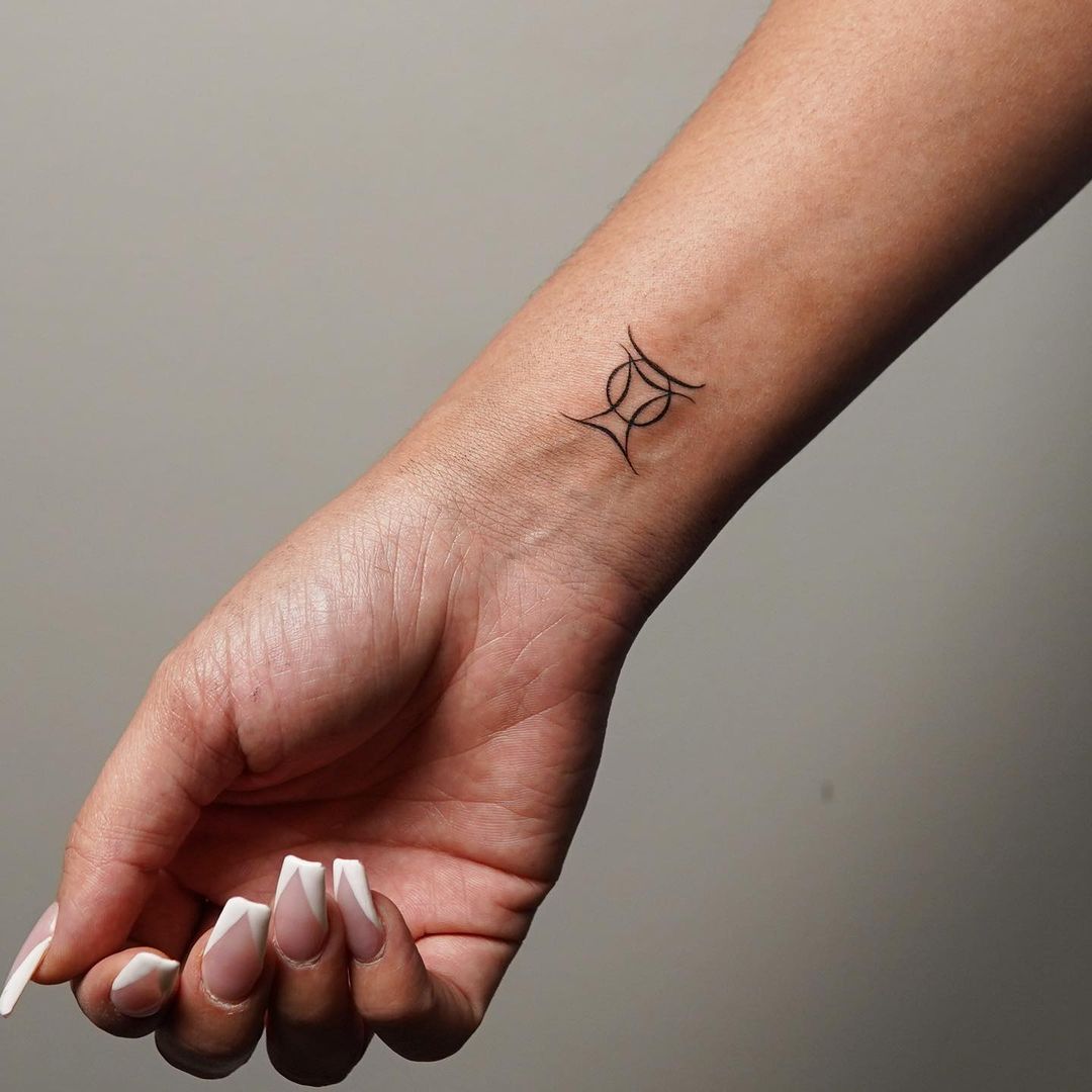 Simply Stylish Gemini Wrist Tattoo