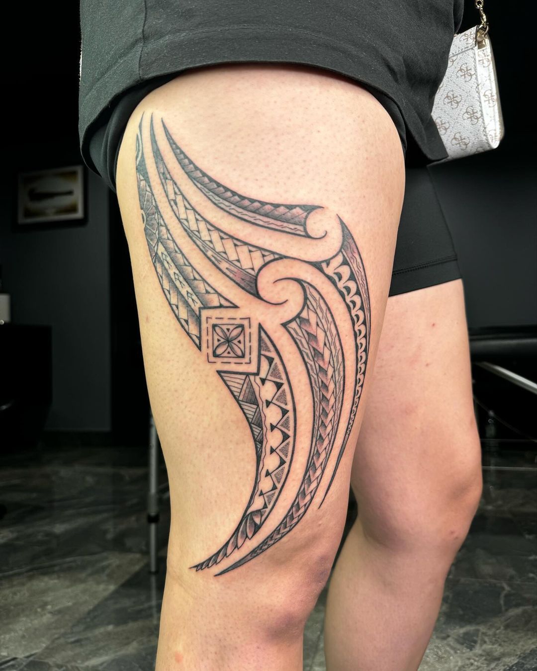 Bold Samoan Leg Tattoo With Traditional Patterns
