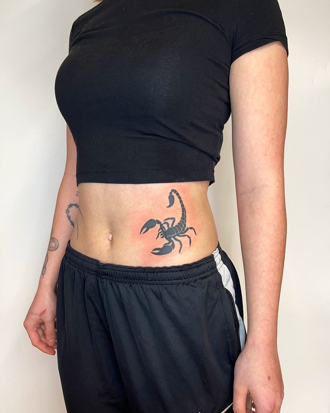 Bold Scorpion Side Tattoo