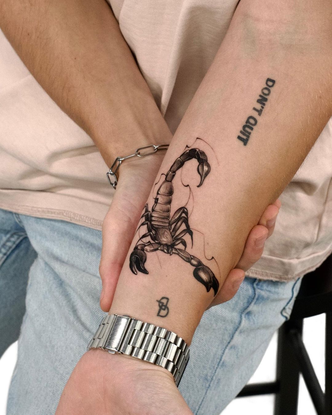 Dynamic Scorpion Forearm Tattoo