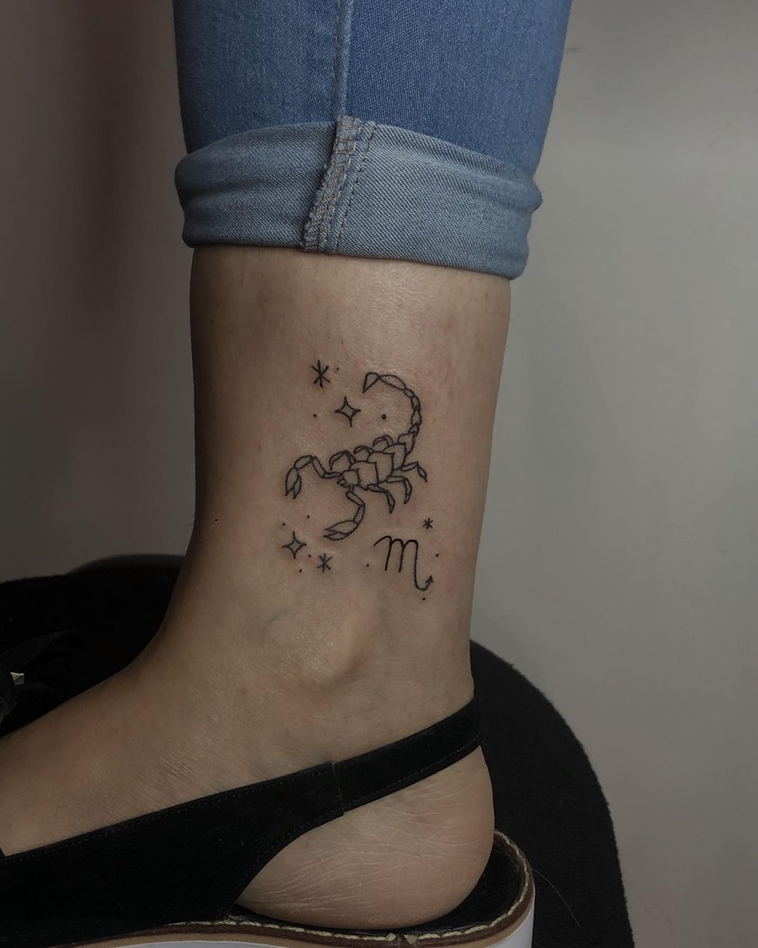 Elegant Scorpio Ankle Tattoo