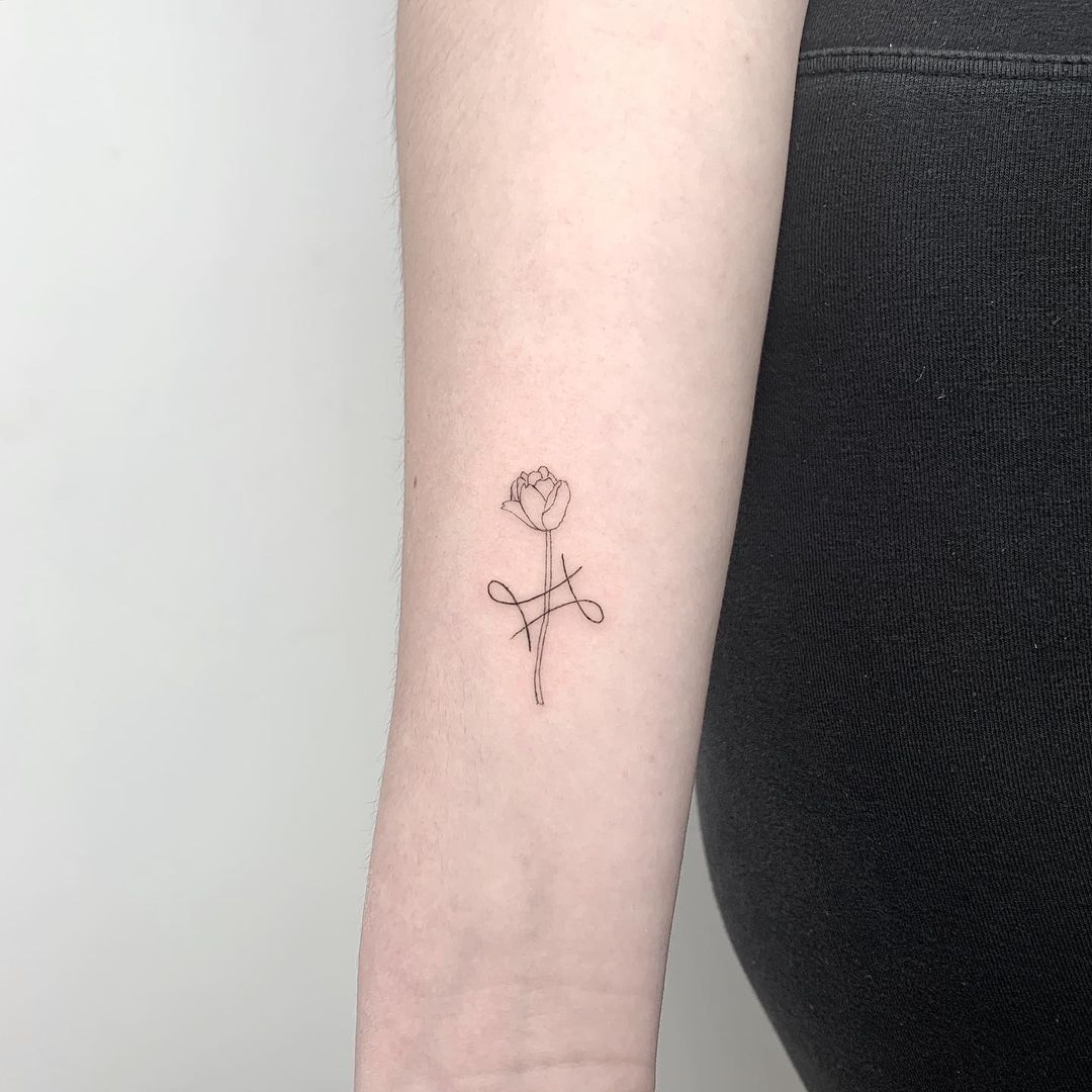 Flower Gemini Arm Tattoo