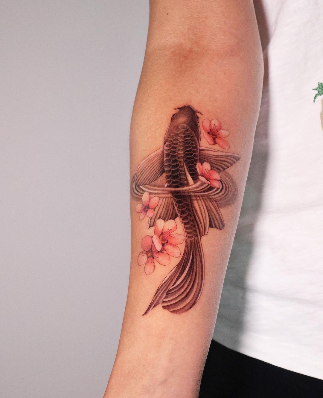 Koi Fish Forearm Tattoo With Cherry Blossoms