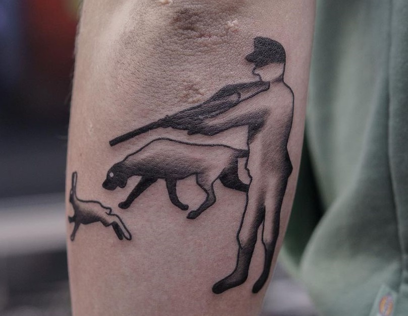 Minimalist Hunting Tattoo Design Near The Elbow