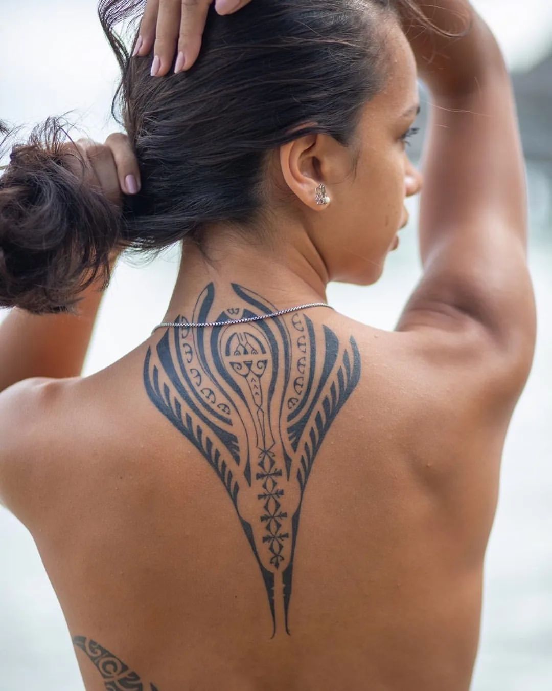 Samoan Back Tattoo With Symbolic Wings