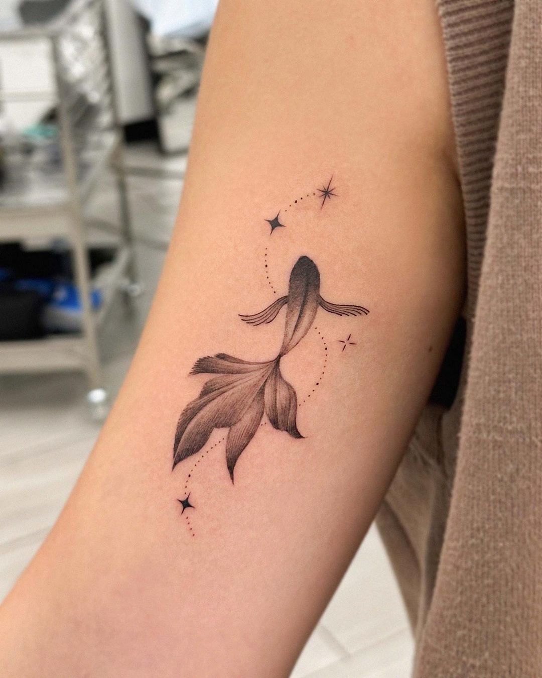 Simple Koi Fish Arm Tattoo