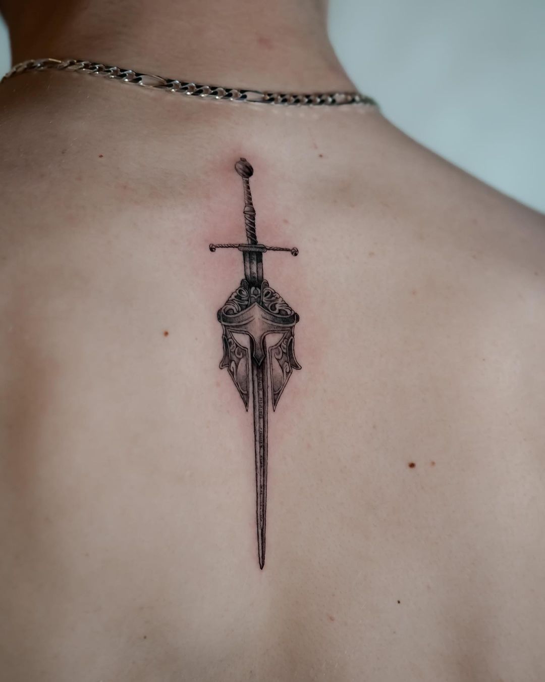 Spartan Sword Tattoo On The Back