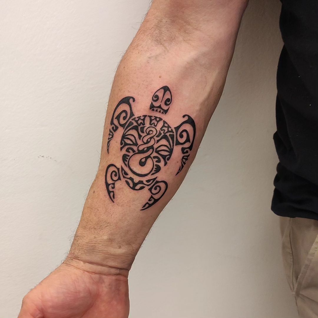 Striking Samoan Arm Tattoo With Tribal Essence