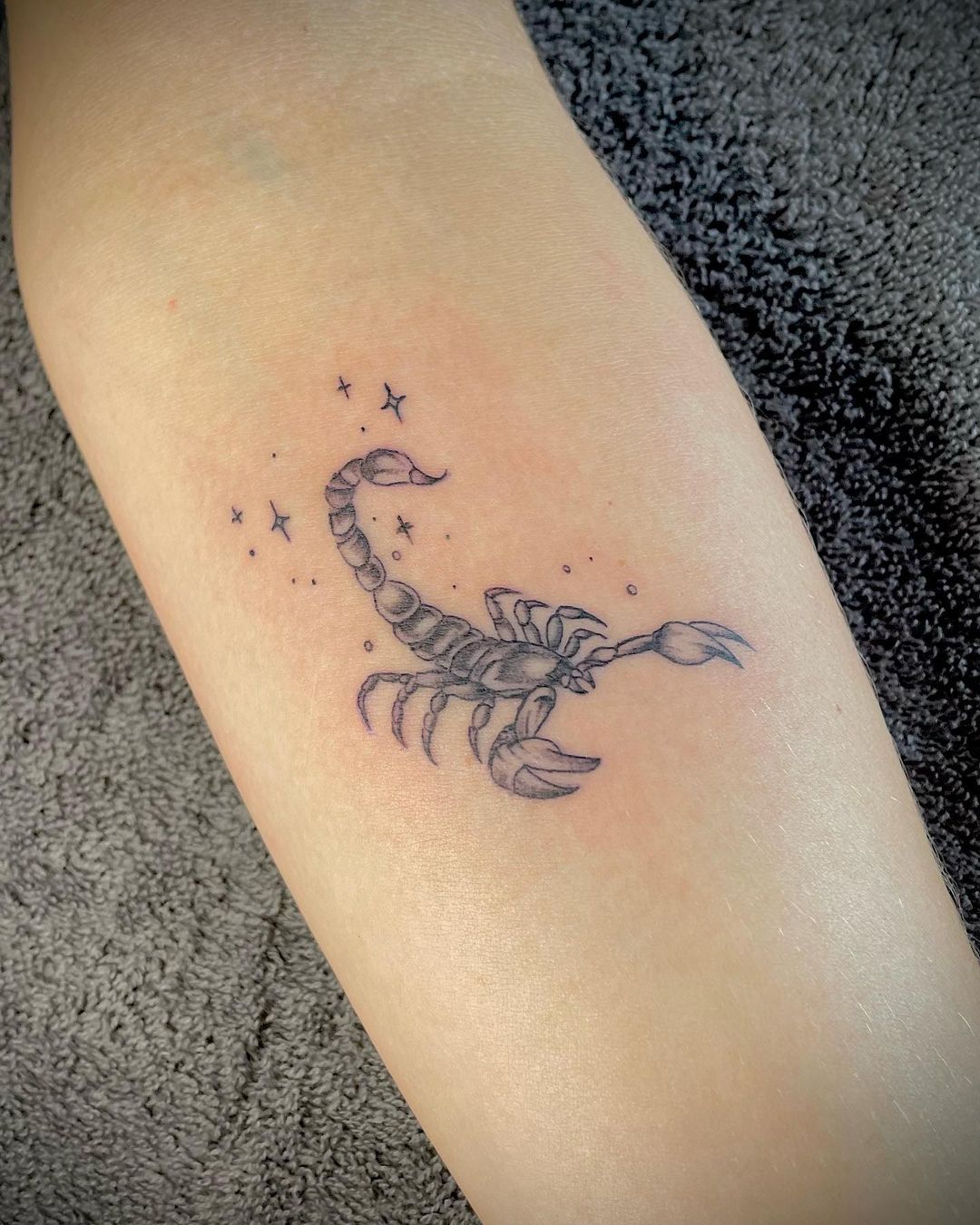 Tiny Scorpion With Stars Tattoo