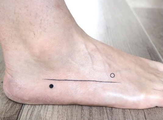 Yin Yang Symbol Tattoo On The Feet