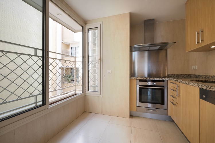L-shaped with Wood Cabinets