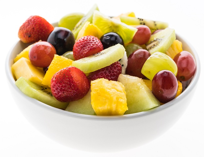 Mixed,fruit,in,white,plate,isolated,on,white,background,
