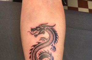 20+ Bold and Mystical Tribal Dragon Tattoo Designs