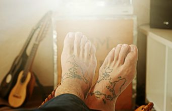 10 Creative World Map Tattoo Ideas for Travel Lovers
